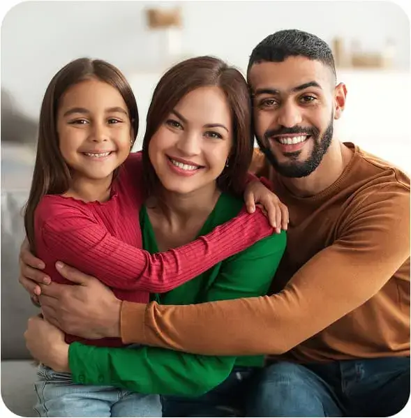 Family smiling after choosing affordable dental insurance and payment options at Pecan Grove Dental in Sherman, TX
